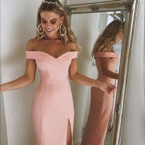 Woman’s off-the-shoulder formal evening gown dress